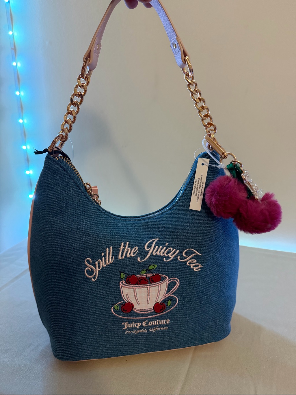 Juicy Couture Denim Shoulder Bag With Pink Pom Pom And Gold Chain
